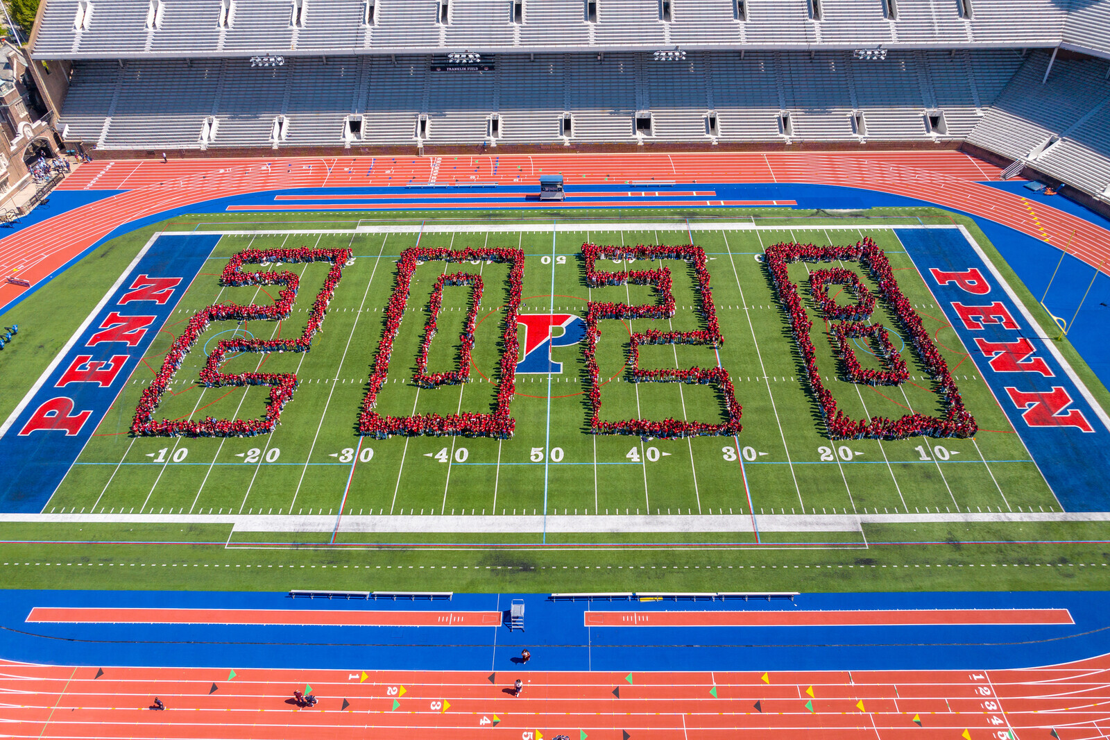 Drone's eye view of the Class of 2028 class photo on Franklin Field