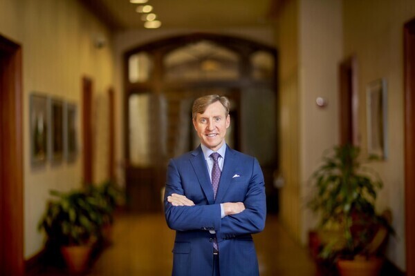 President Jameson posing for portrait in College Hall